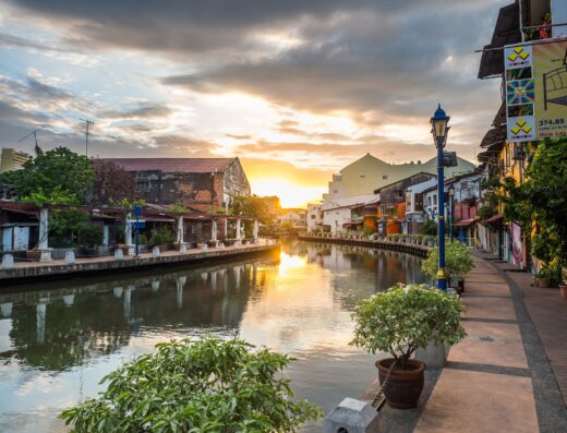 Malacca driver -Early morning with sunrise along the old building with footpath on riverside.